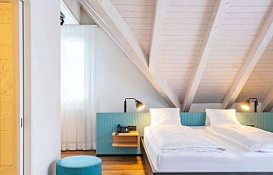 Modern bedroom with wooden ceiling