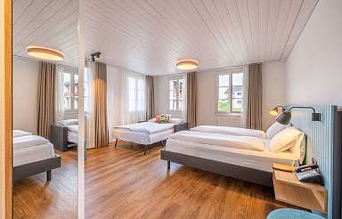 Modern bedroom with wooden ceiling
