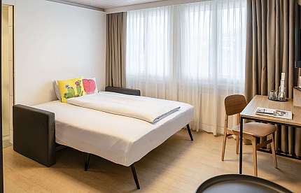 Modern hotel room with bed